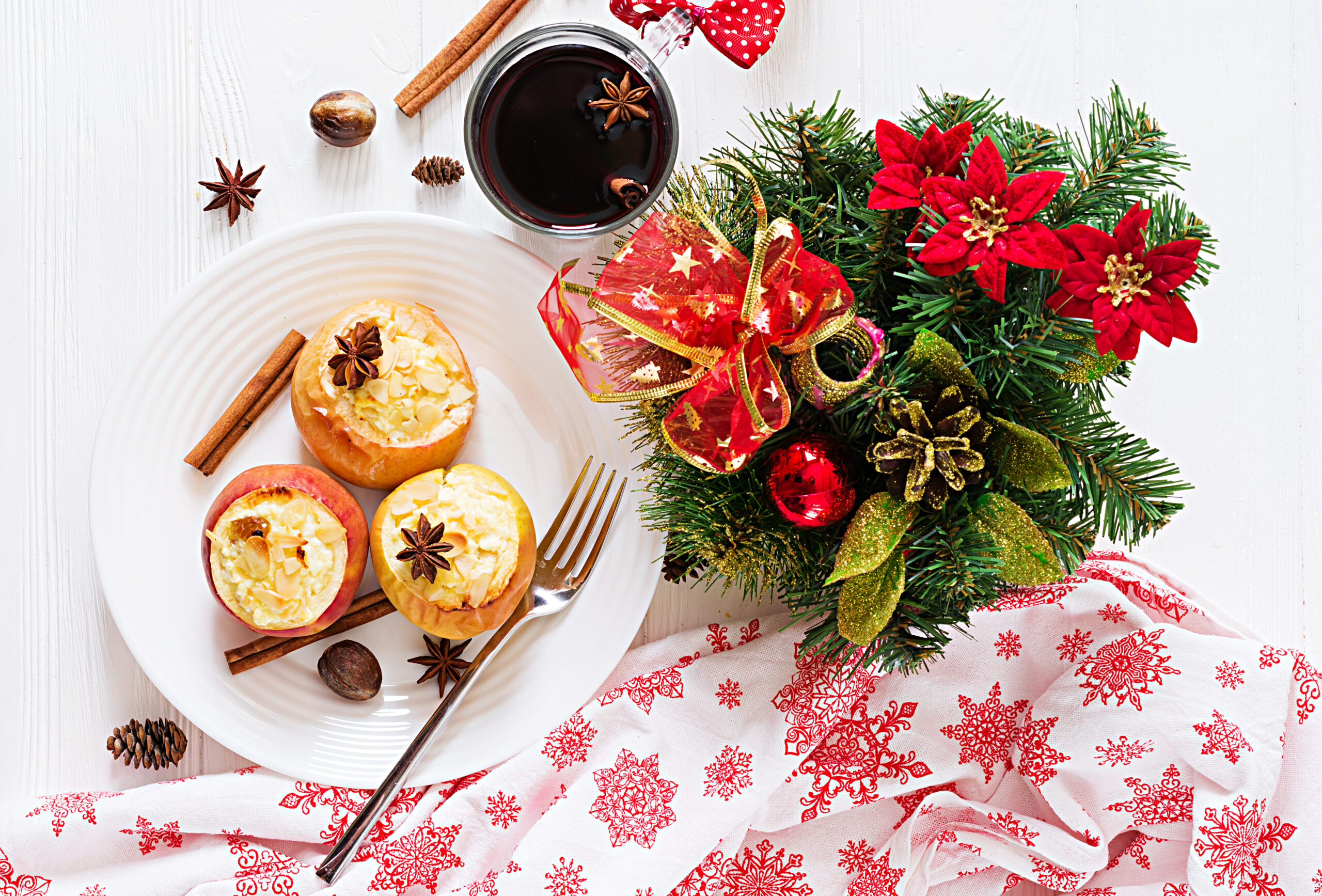 stuffed-baked-apples-with-cottage-cheese-raisins-almonds-christmas-white-table-xmas-food-dessert